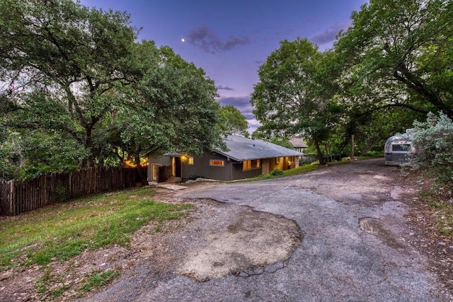 907 The High Rd, Austin, TX 78746 - view of front facade featuring driveway