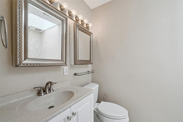 907 The High Rd, Austin, TX 78746 - bathroom with vanity and toilet