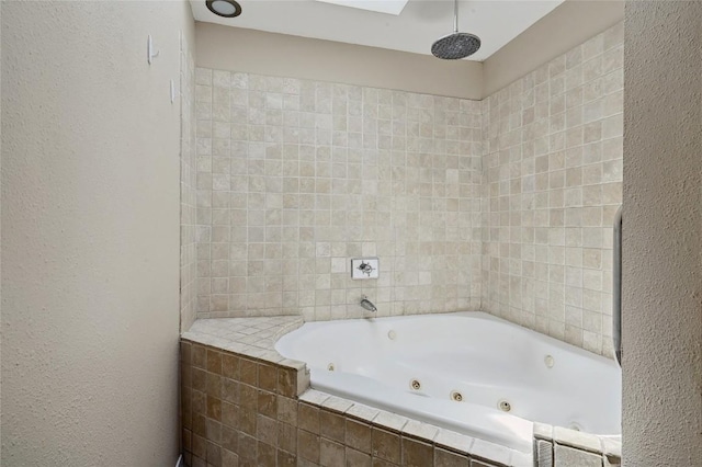 907 The High Rd, Austin, TX 78746 - bathroom with a tub with jets and a textured wall
