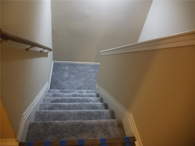1516 Anise Dr, Austin, TX 78741 - stairs with carpet floors and baseboards