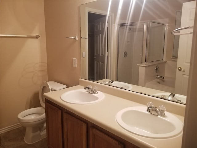 1516 Anise Dr, Austin, TX 78741 - bathroom featuring toilet and double vanity