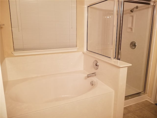 1516 Anise Dr, Austin, TX 78741 - full bath with a shower stall and a garden tub