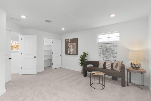 2705 Sage Ranch Dr Unit 2, Leander, TX 78641 - living room with carpet flooring, baseboards, and recessed lighting