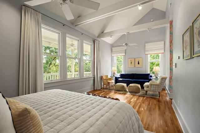 800 W Lynn St, Austin, TX 78703 - bedroom with wood finished floors, baseboards, ceiling fan, and rail lighting
