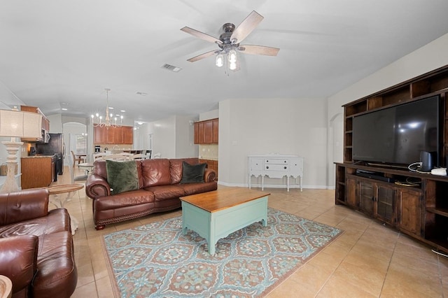 1286 Talley Loop, Buda, TX 78610 - living room with light tile patterned floors, a ceiling fan, and baseboards