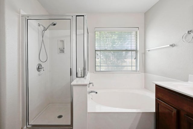 1286 Talley Loop, Buda, TX 78610 - bathroom with a garden tub, a stall shower, and plenty of natural light
