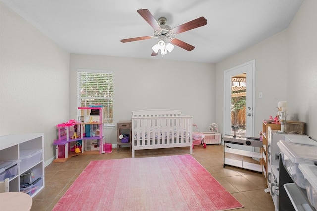 1286 Talley Loop, Buda, TX 78610 - tiled bedroom with ceiling fan