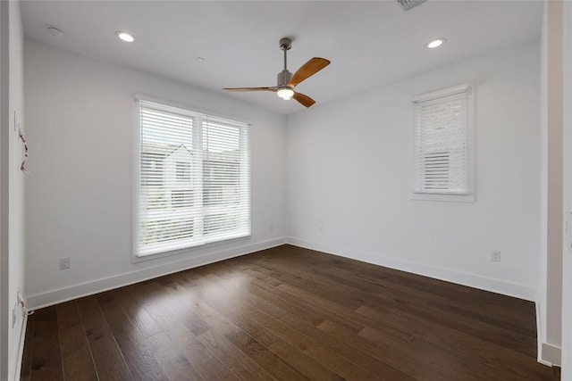 4703 Unity Cir Unit 284, Austin, TX 78731 - unfurnished room with ceiling fan, baseboards, dark wood-style flooring, recessed lighting, and a smoke detector