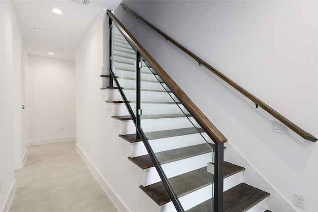 4703 Unity Cir Unit 284, Austin, TX 78731 - stairs featuring baseboards and recessed lighting