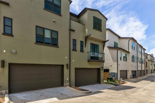 4703 Unity Cir Unit 284, Austin, TX 78731 - view of property with a residential view and an attached garage