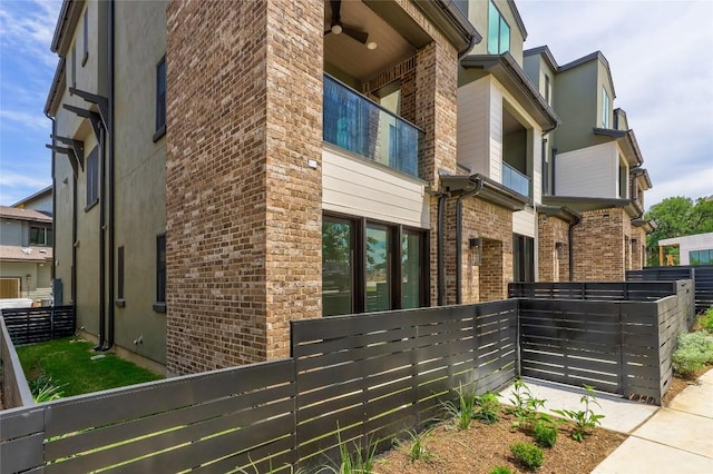 4703 Unity Cir Unit 284, Austin, TX 78731 - view of home's exterior with brick siding