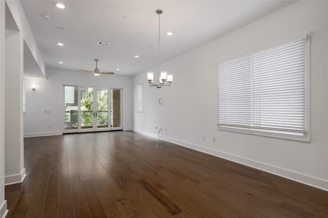 4703 Unity Cir Unit 284, Austin, TX 78731 - empty room featuring a chandelier, baseboards, dark wood-style floors, a ceiling fan, and recessed lighting