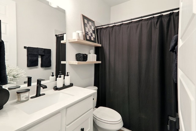 112 Rosemary Ct, Bastrop, TX 78602 - bathroom with toilet, vanity, and curtained shower