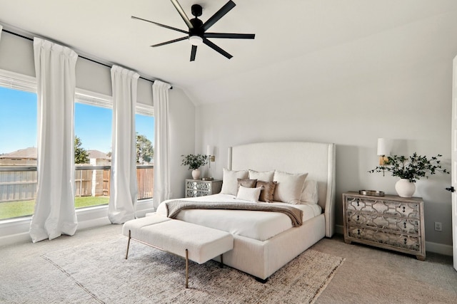 112 Rosemary Ct, Bastrop, TX 78602 - carpeted bedroom with vaulted ceiling, baseboards, and ceiling fan