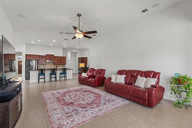 13708 Field Stream Ln, Manor, TX 78653 - living area with ceiling fan, light tile patterned floors, and recessed lighting