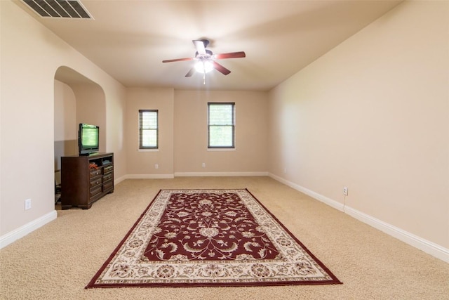 11925 Timber Heights Dr, Austin, TX 78754 - empty room with carpet floors, ceiling fan, and baseboards