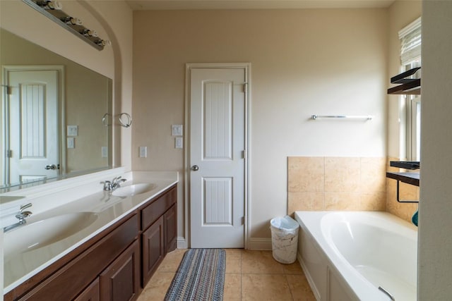 11925 Timber Heights Dr, Austin, TX 78754 - bathroom featuring a bath, double vanity, and tile patterned floors