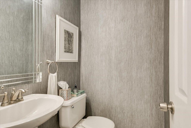 1704 Prairie Hen Cv, Austin, TX 78758 - bathroom with a sink and toilet
