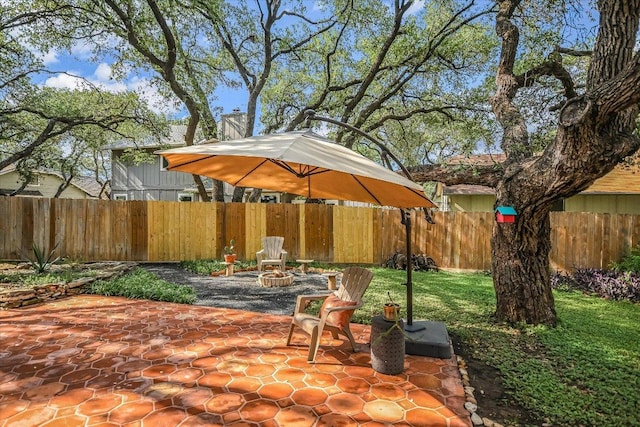 1704 Prairie Hen Cv, Austin, TX 78758 - fenced backyard with a patio area