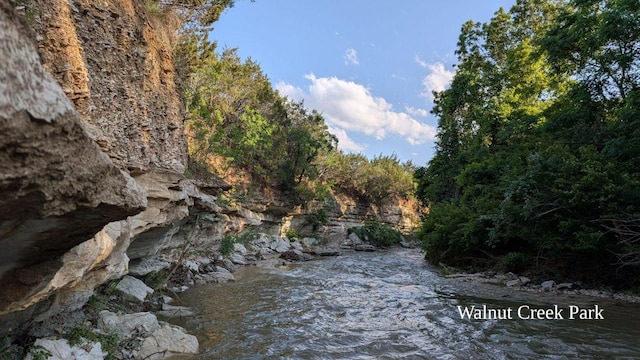 1704 Prairie Hen Cv, Austin, TX 78758 - water view with a forest
