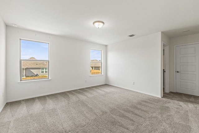 18517 Spotted Eagle Ln, Elgin, TX 78621 - carpeted spare room featuring baseboards and a smoke detector