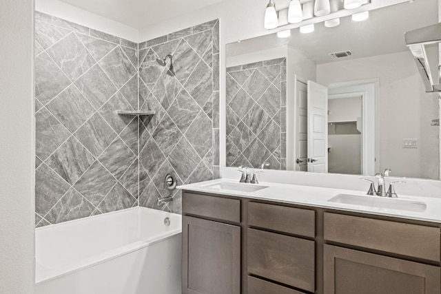18517 Spotted Eagle Ln, Elgin, TX 78621 - full bathroom featuring shower / tub combination and double vanity