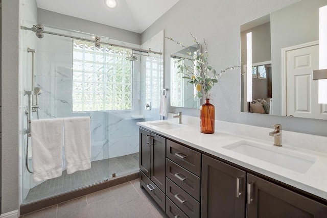 2517 Moray Ln, Cedar Park, TX 78613 - full bath with double vanity, a marble finish shower, and tile patterned flooring