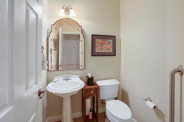 2517 Moray Ln, Cedar Park, TX 78613 - half bath with toilet, a sink, and baseboards