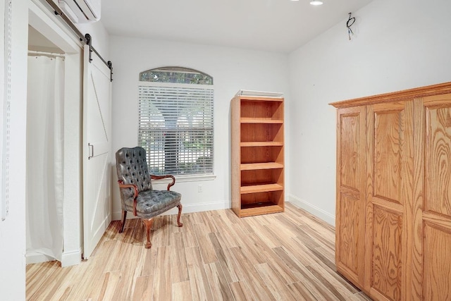 2517 Moray Ln, Cedar Park, TX 78613 - living area featuring a barn door, light wood-style floors, plenty of natural light, and recessed lighting