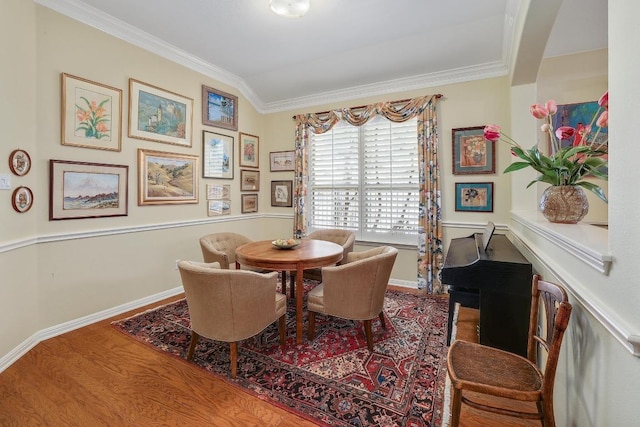 2517 Moray Ln, Cedar Park, TX 78613 - dining area featuring crown molding, wood finished floors, and baseboards