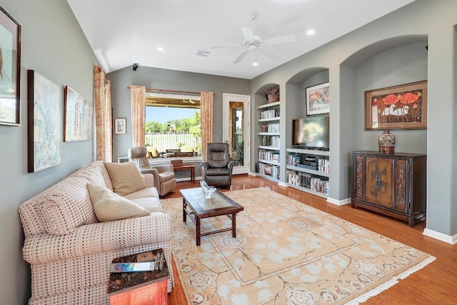 2517 Moray Ln, Cedar Park, TX 78613 - living room with built in features, ceiling fan, baseboards, wood finished floors, and recessed lighting