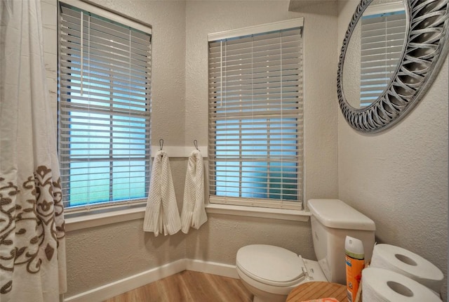 615 Twin Oak Trl, Cedar Park, TX 78613 - bathroom with wood finished floors and a textured wall