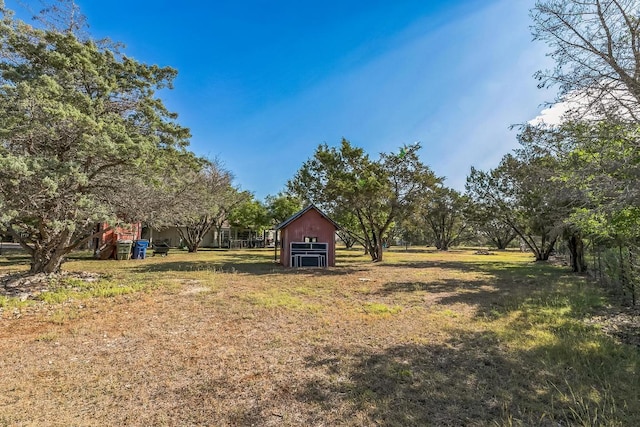 909 Oak Meadow Dr, Dripping Springs, TX 78620 - view of grassy yard with an outbuilding