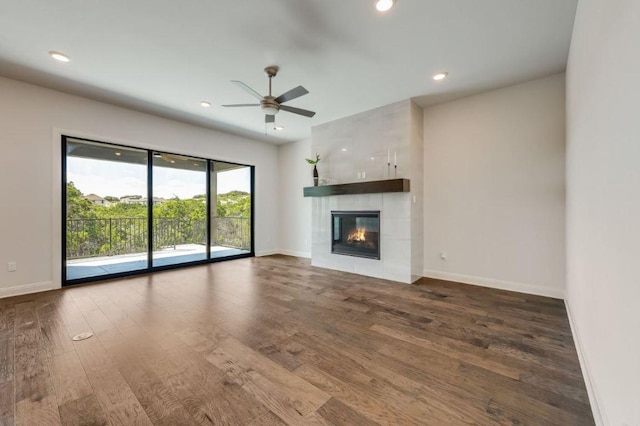 6833 Destination Way, Lago Vista, TX 78645 - unfurnished living room featuring wood finished floors, ceiling fan, recessed lighting, and a fireplace