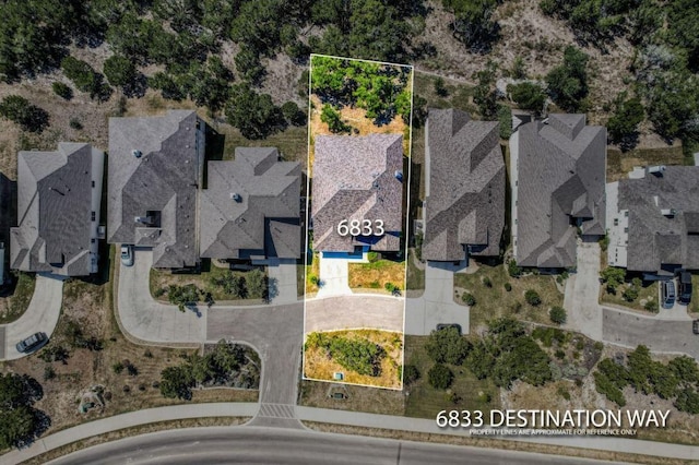 6833 Destination Way, Lago Vista, TX 78645 - aerial perspective of suburban area featuring property parcel outlined