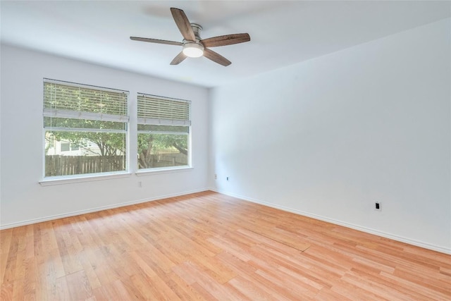 14710 Montoro Dr, Austin, TX 78728 - unfurnished room featuring light wood-style flooring, ceiling fan, and baseboards