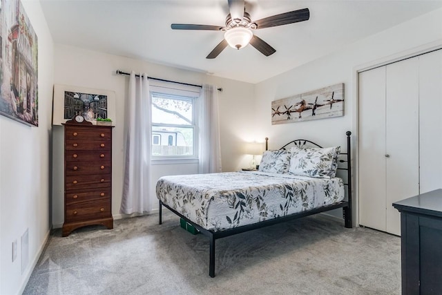 110 Fleetwood Dr, New Braunfels, TX 78130 - bedroom with light carpet, a closet, and ceiling fan