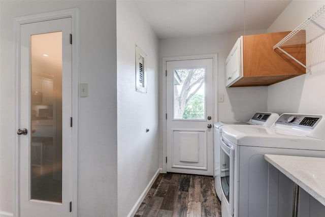 110 Fleetwood Dr, New Braunfels, TX 78130 - washroom featuring cabinet space, dark wood-type flooring, and washing machine and dryer