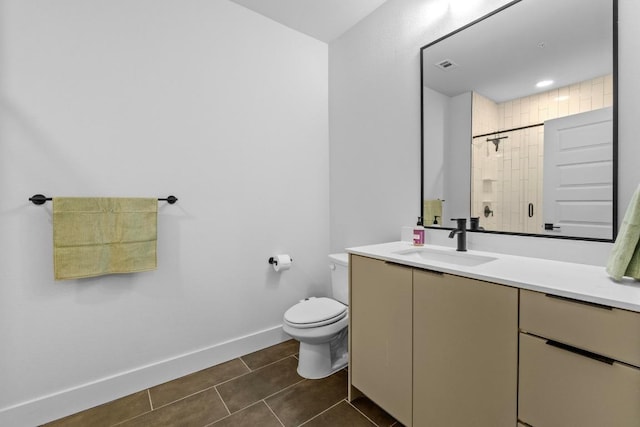 2500 Longview St Unit 112, Austin, TX 78705 - full bathroom featuring vanity, tile patterned floors, toilet, a shower, and baseboards