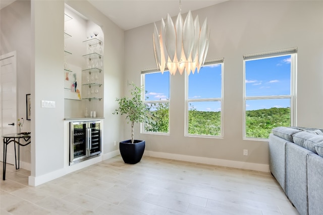 105 Golden Eagle, Horseshoe Bay, TX 78657 - dining area featuring beverage cooler, a bar, and baseboards