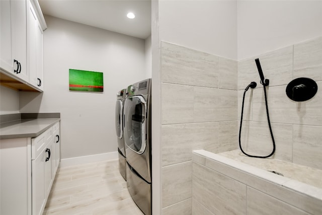 105 Golden Eagle, Horseshoe Bay, TX 78657 - laundry room featuring separate washer and dryer, baseboards, and recessed lighting