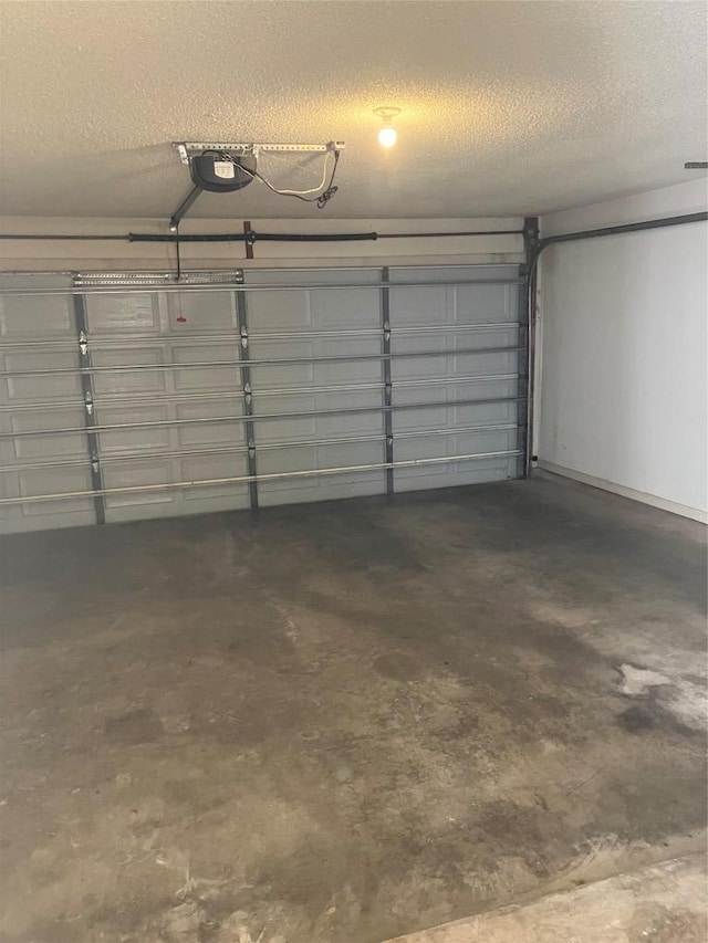 7201 Chimney Cors, Austin, TX 78731 - garage featuring a garage door opener