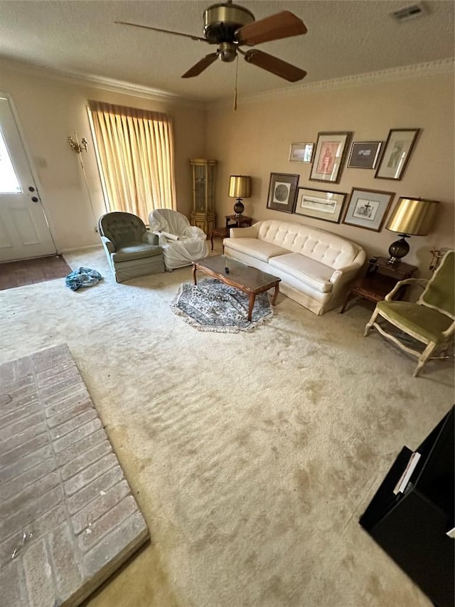 7201 Chimney Cors, Austin, TX 78731 - living room featuring crown molding, ceiling fan, carpet floors, and a textured ceiling