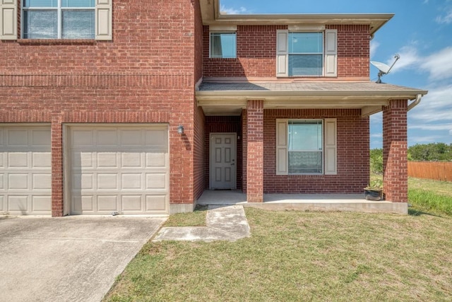 9104 China Rose Dr, Austin, TX 78724 - view of front of property featuring brick siding, concrete driveway, and a garage