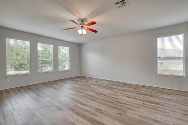 9104 China Rose Dr, Austin, TX 78724 - empty room with a ceiling fan and light wood-type flooring