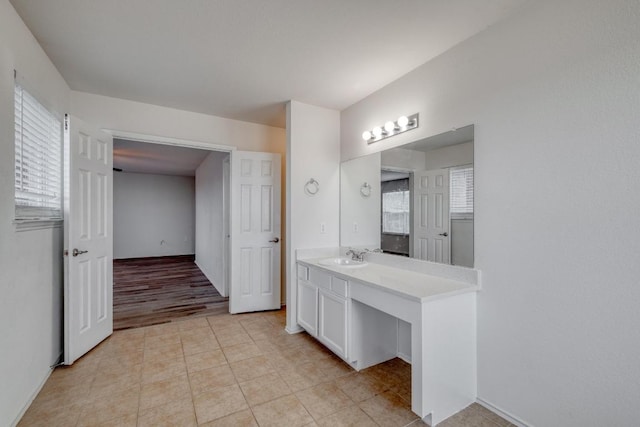 9104 China Rose Dr, Austin, TX 78724 - bathroom featuring vanity and plenty of natural light