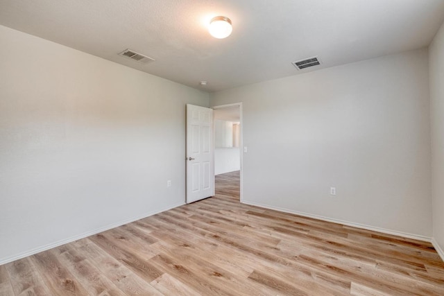 9104 China Rose Dr, Austin, TX 78724 - empty room with light wood finished floors and baseboards