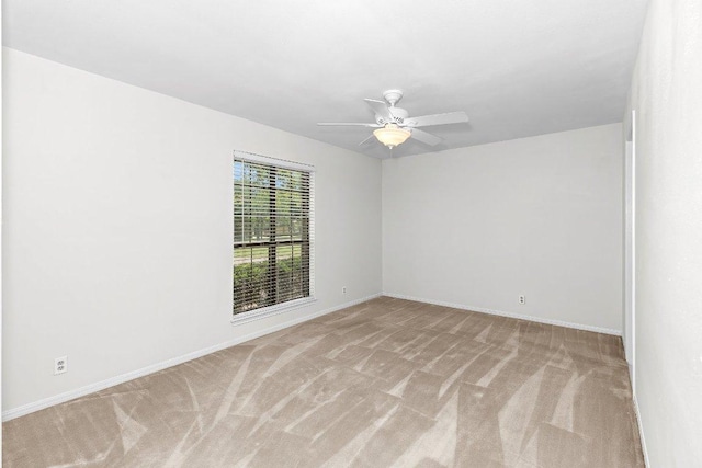 302 Council Rd, Georgetown, TX 78633 - empty room featuring light carpet, a ceiling fan, and baseboards