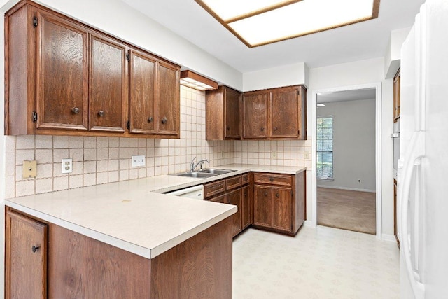 302 Council Rd, Georgetown, TX 78633 - kitchen with a sink, light countertops, light floors, and backsplash