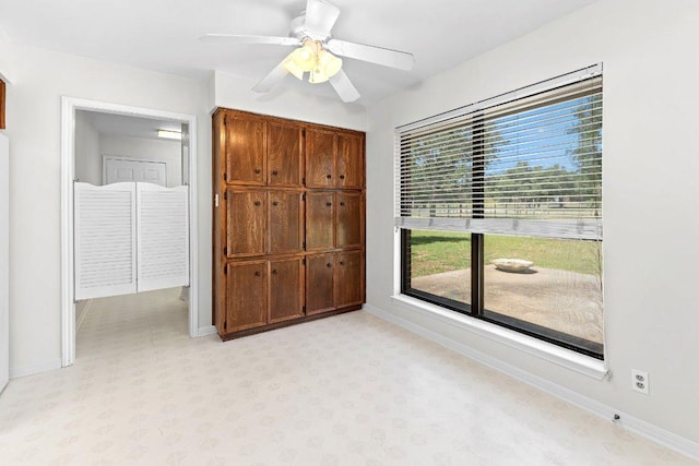 302 Council Rd, Georgetown, TX 78633 - unfurnished bedroom featuring baseboards, a closet, and ceiling fan